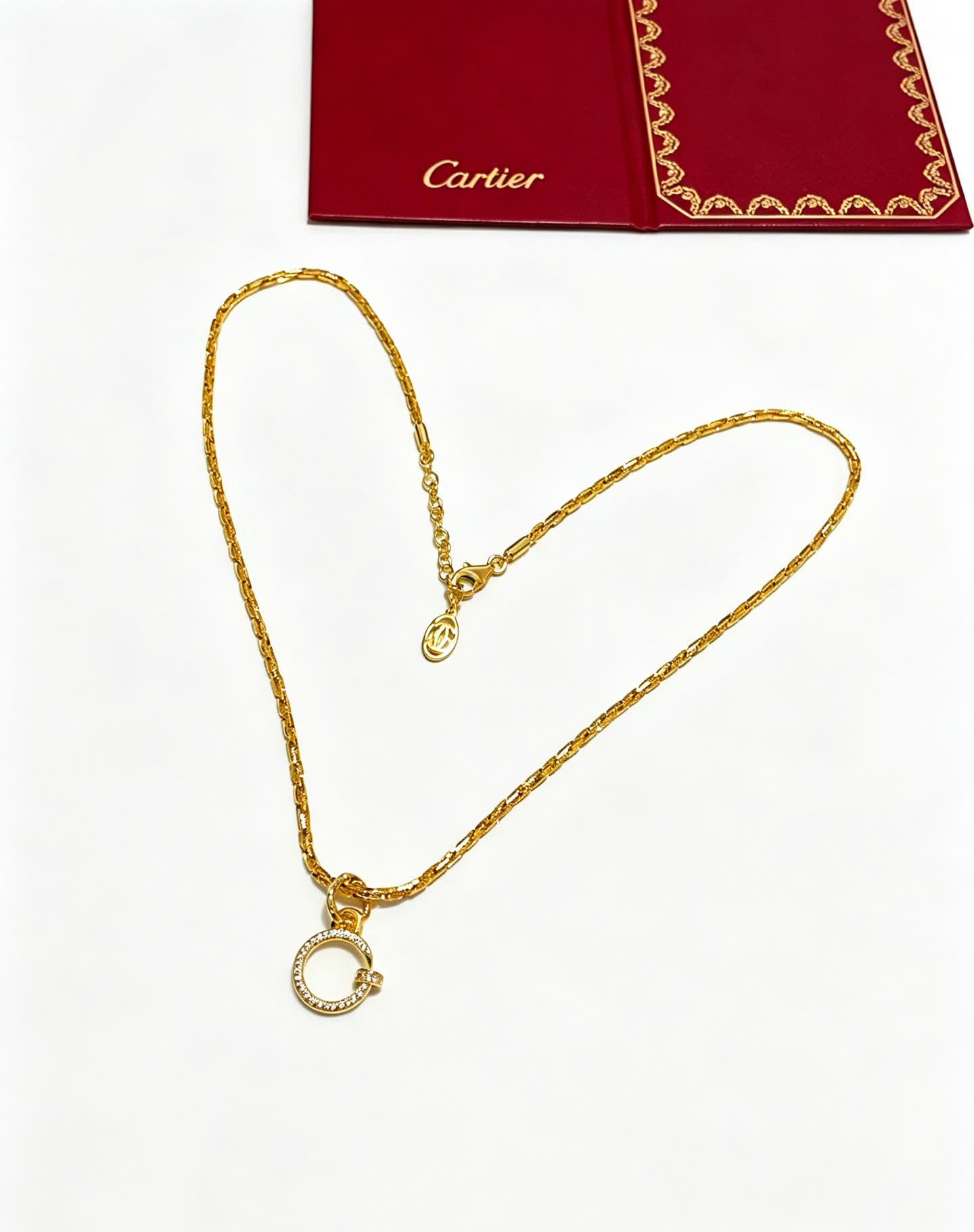 Cartier Elegant Gold Circle Pendant Necklace