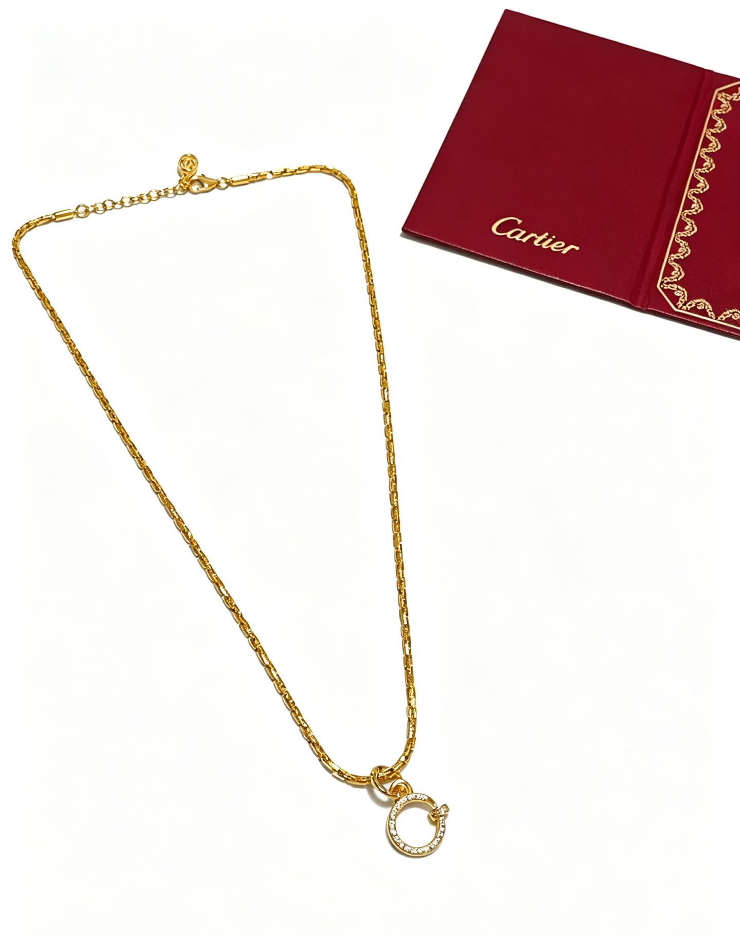 Cartier Elegant Gold Circle Pendant Necklace