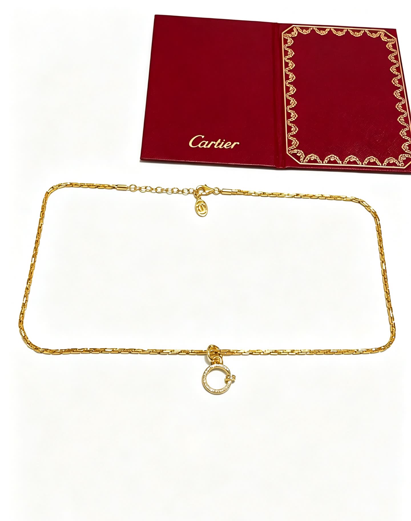 Cartier Elegant Gold Circle Pendant Necklace