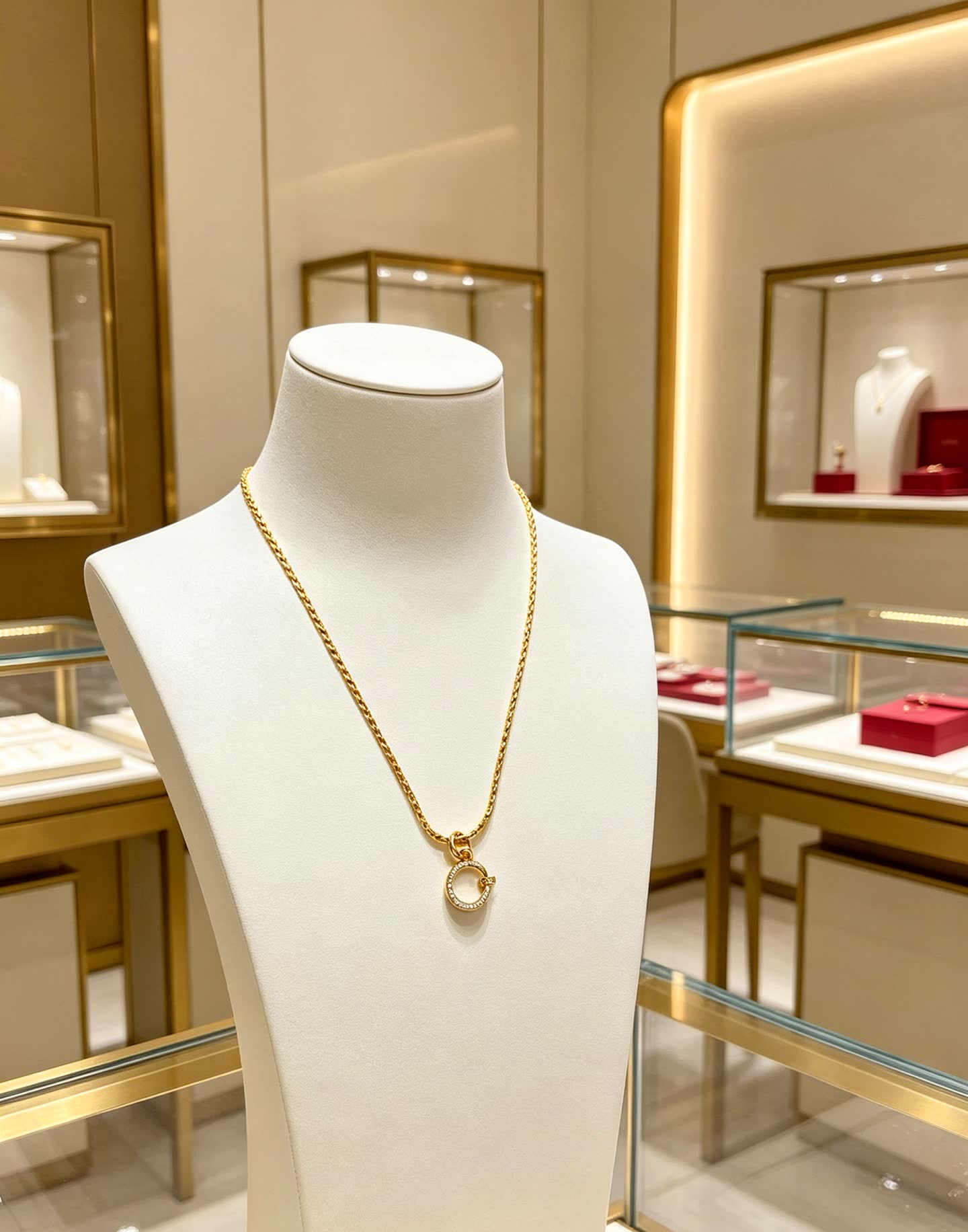 Cartier Elegant Gold Circle Pendant Necklace