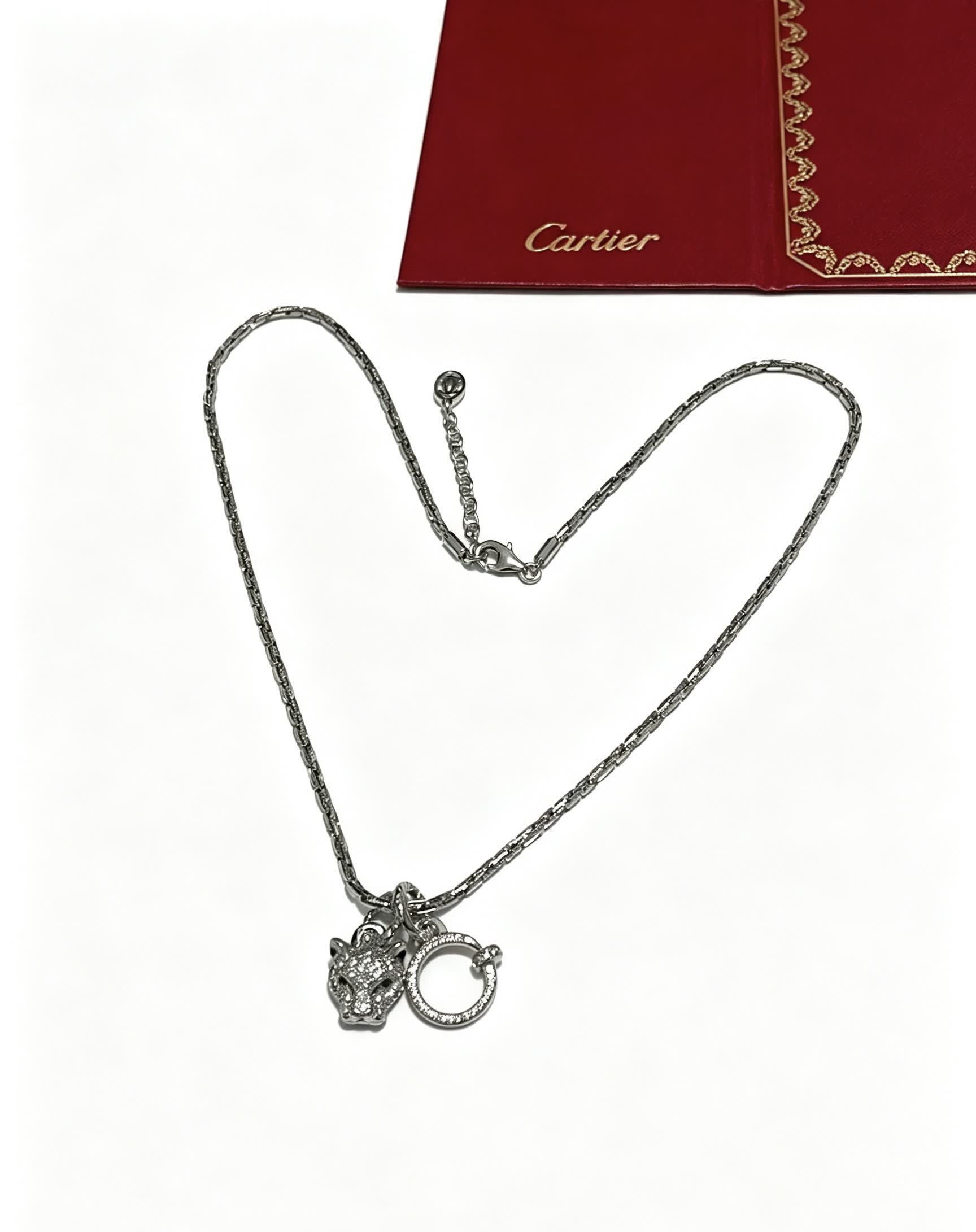 Cartier Silver Necklace with Diamond-Encrusted Panther and Ring Design