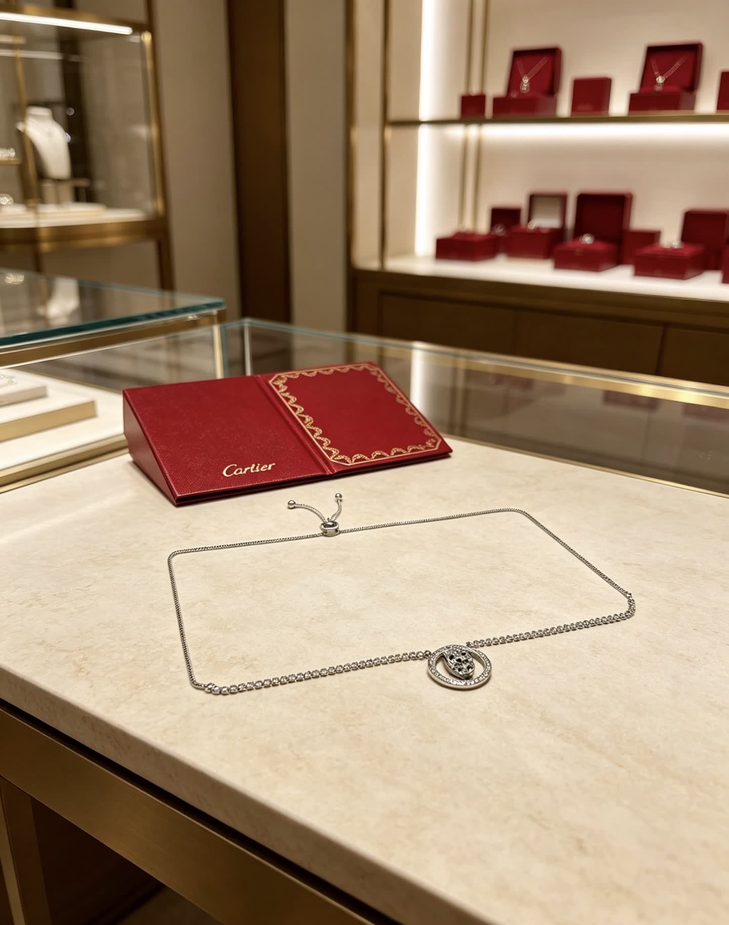 Cartier Silver Circle Leopard Pendant Necklace