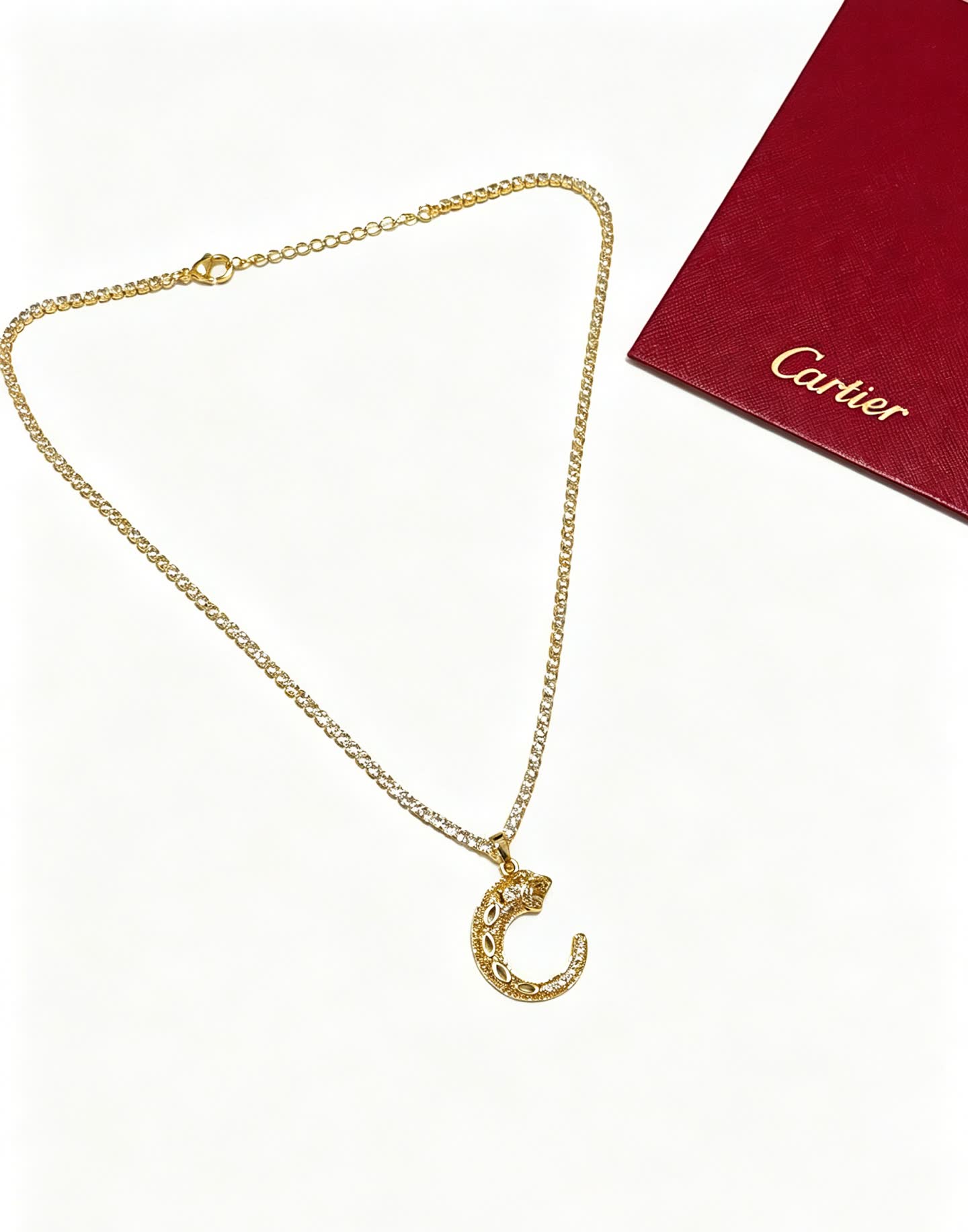 Cartier Gold and Diamond Crescent Moon Necklace