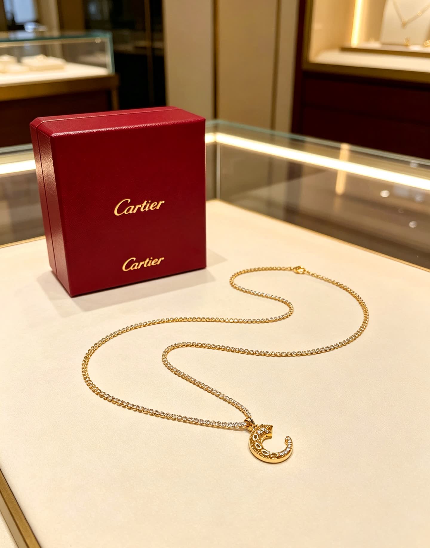 Cartier Gold and Diamond Crescent Moon Necklace