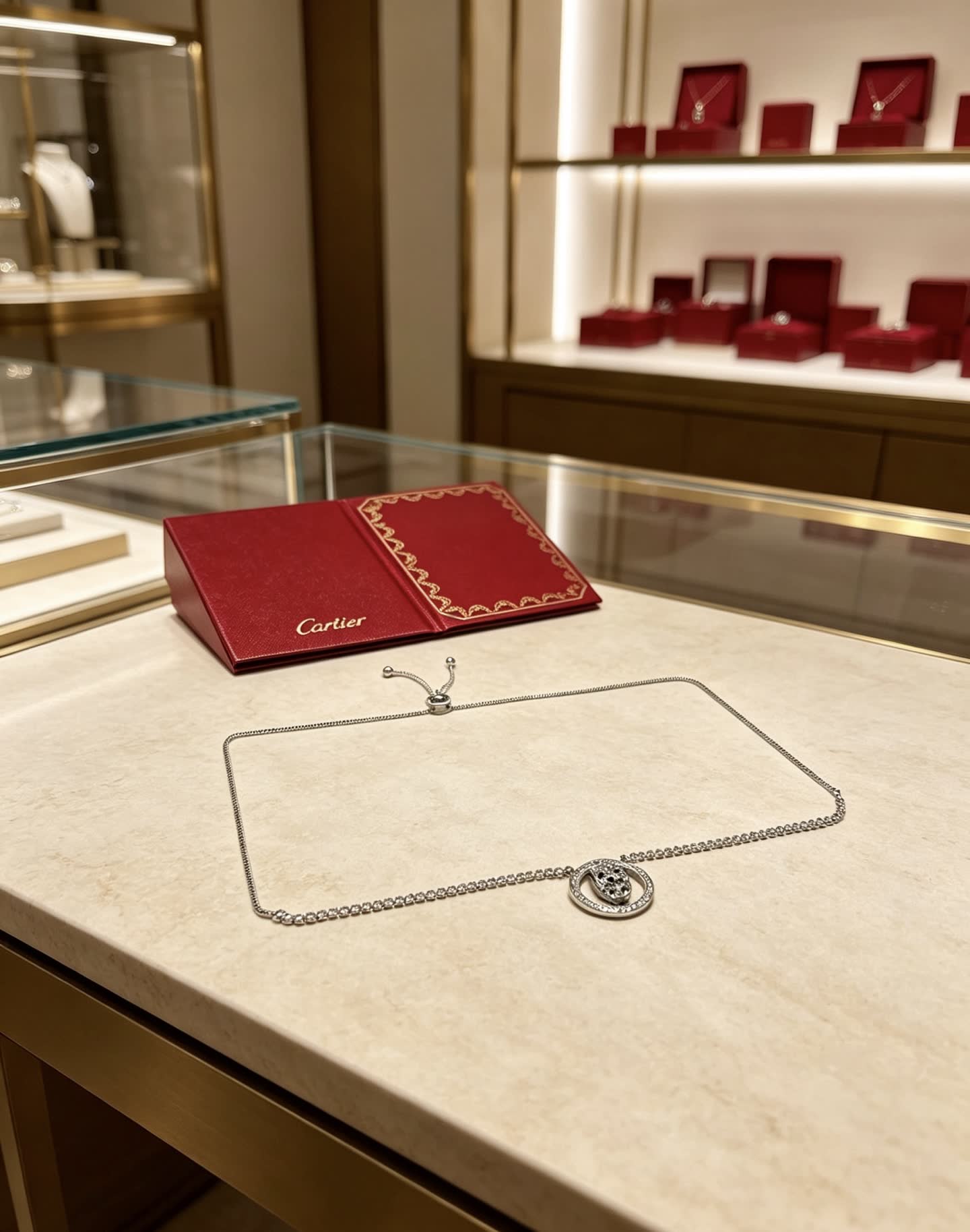 Cartier Silver Circle Leopard Pendant Necklace
