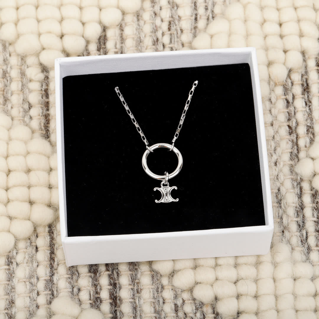 Celine Paris Silver Charm Necklace
