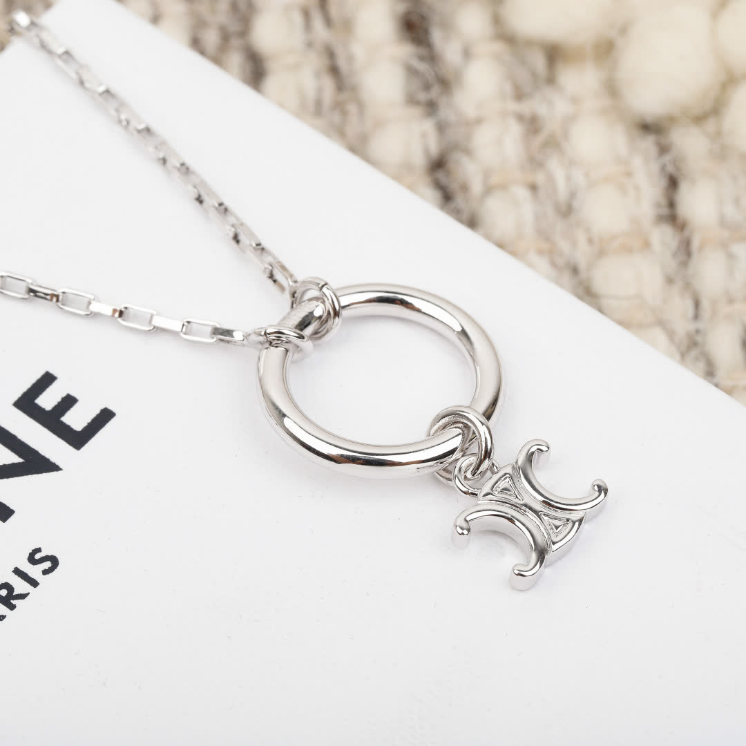 Celine Paris Silver Charm Necklace