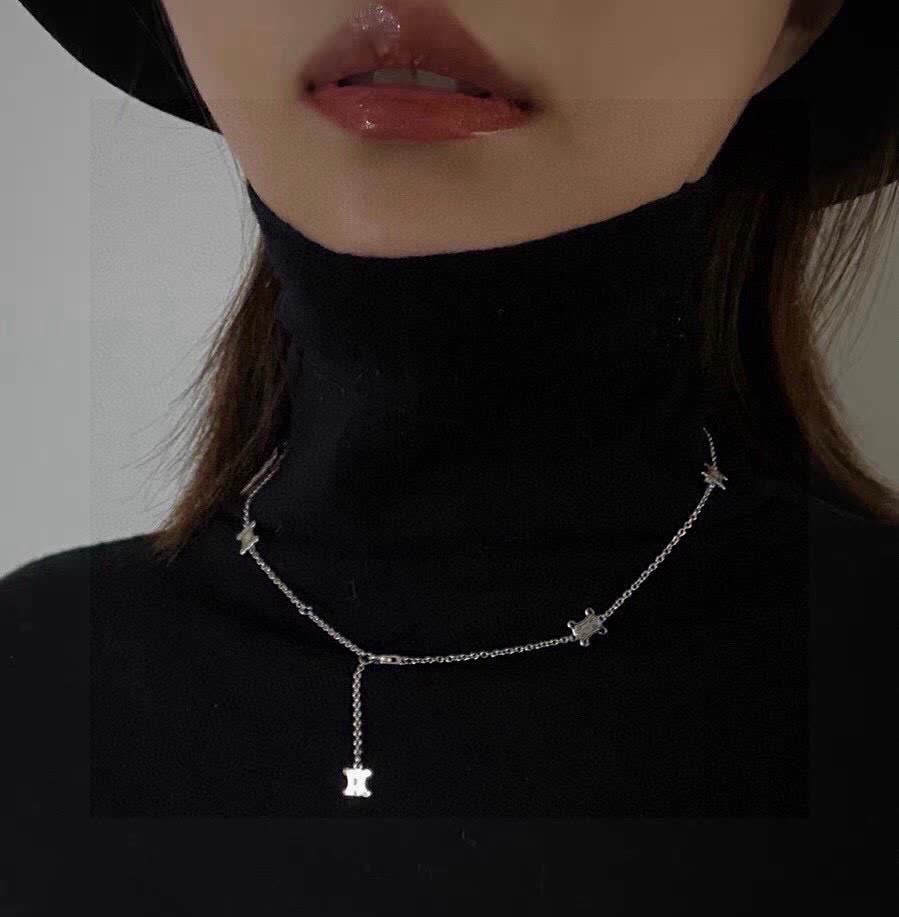 Celine Silver 'X' Charm Necklace