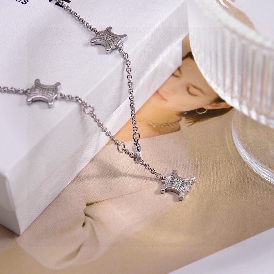 Celine Silver 'X' Charm Necklace