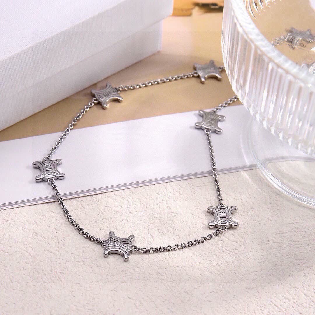 Celine Silver 'X' Charm Necklace