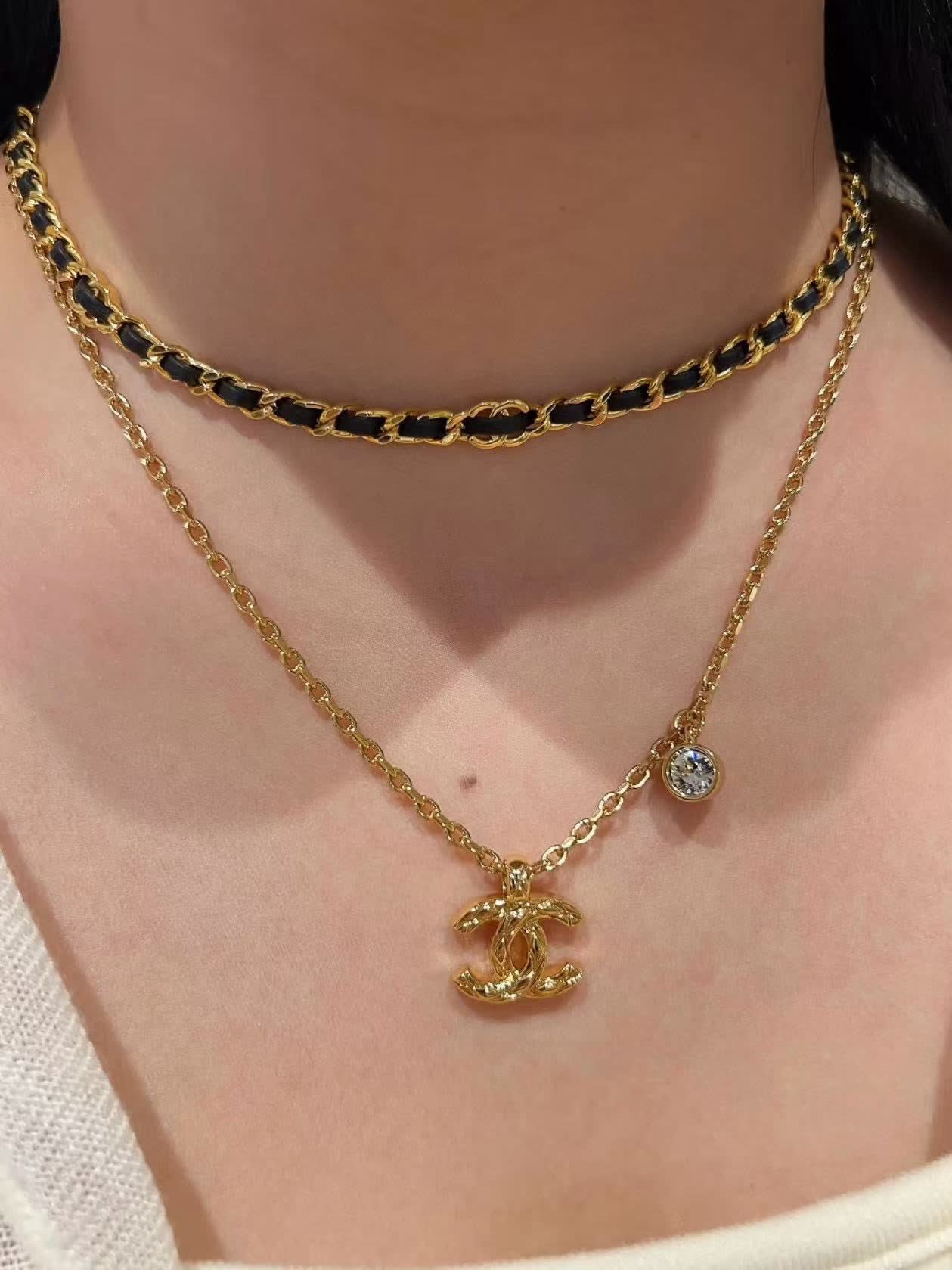Chanel CC Logo Gold Tone Necklace with Crystal Charm