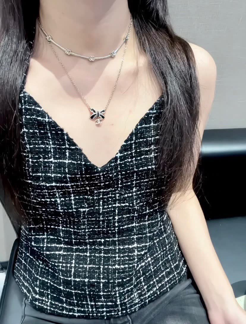 Chanel Gold Tone Black Bow Necklace