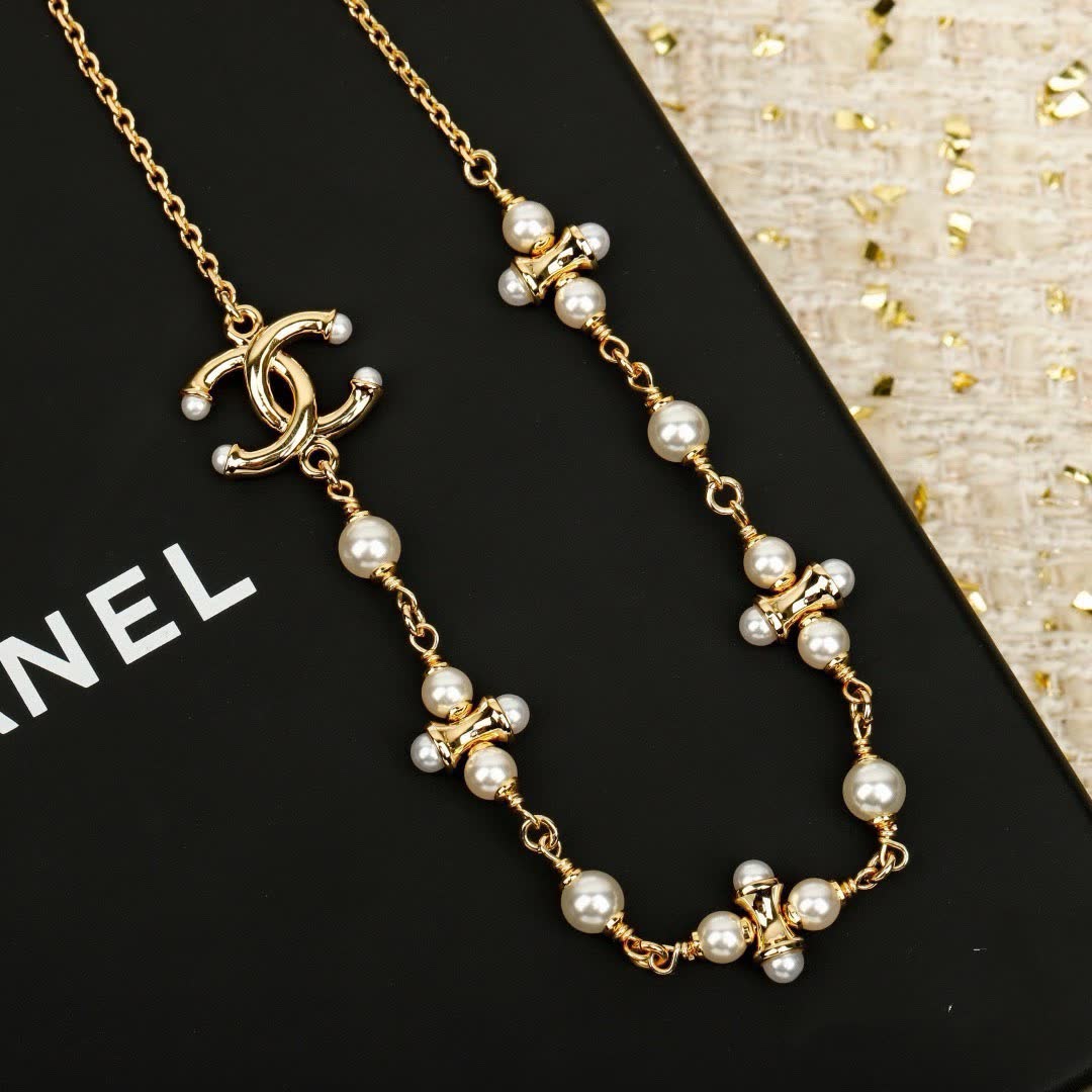 Chanel Pearl and CC Logo Necklace
