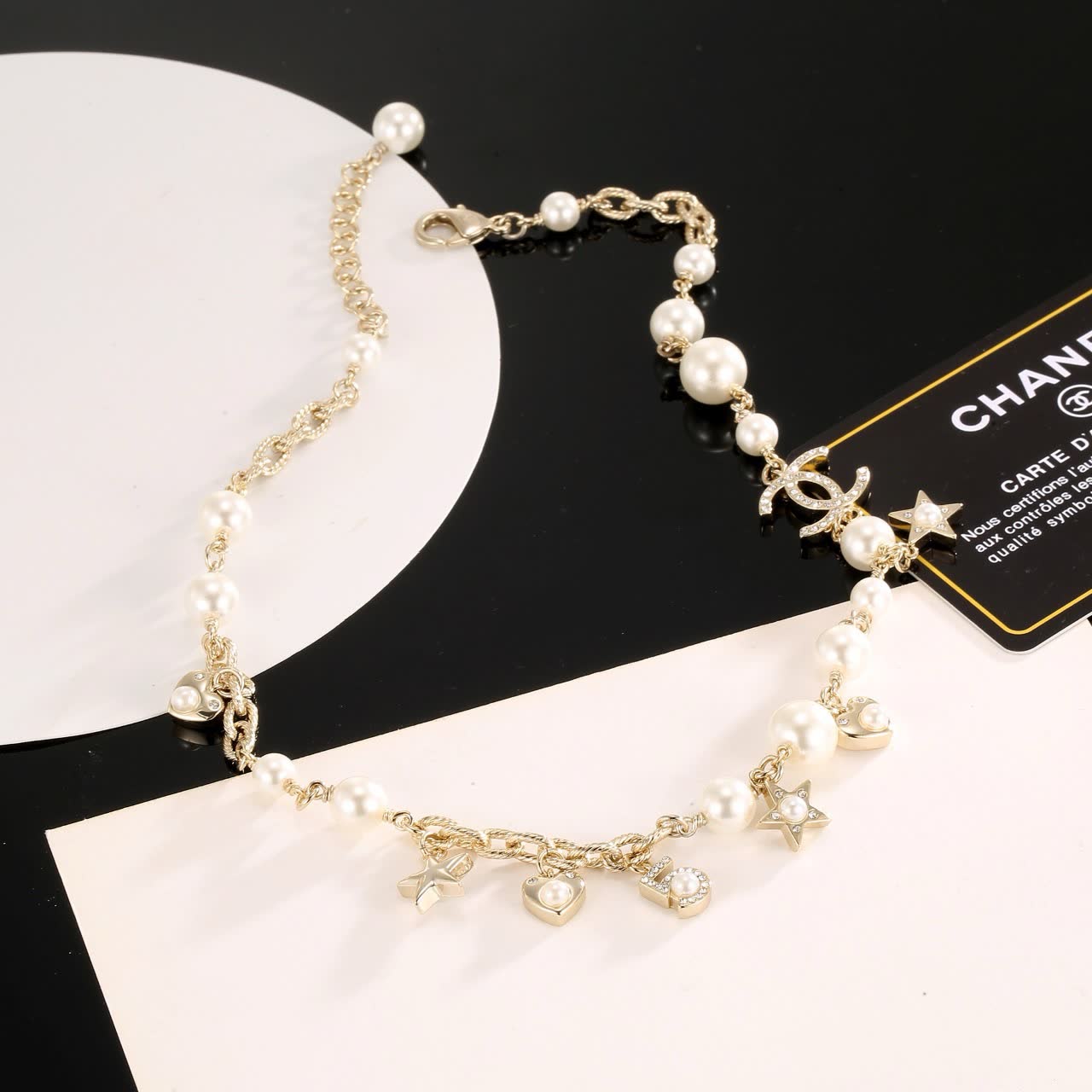 Chanel Pearl and Charm Necklace