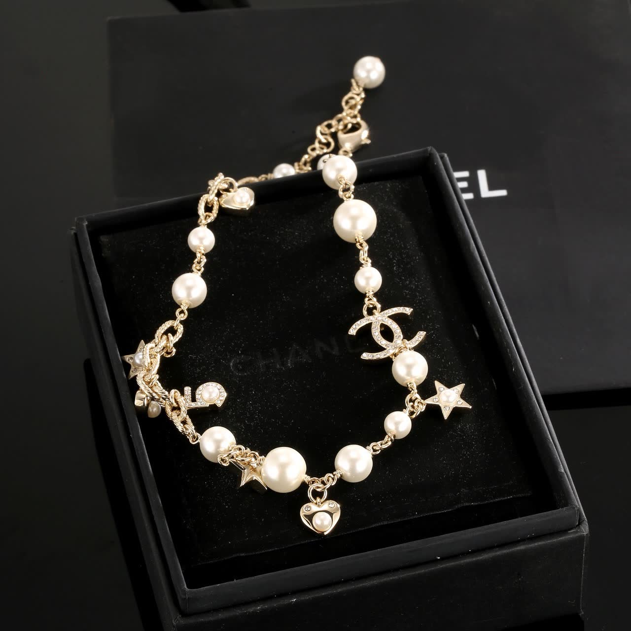 Chanel Pearl and Charm Necklace