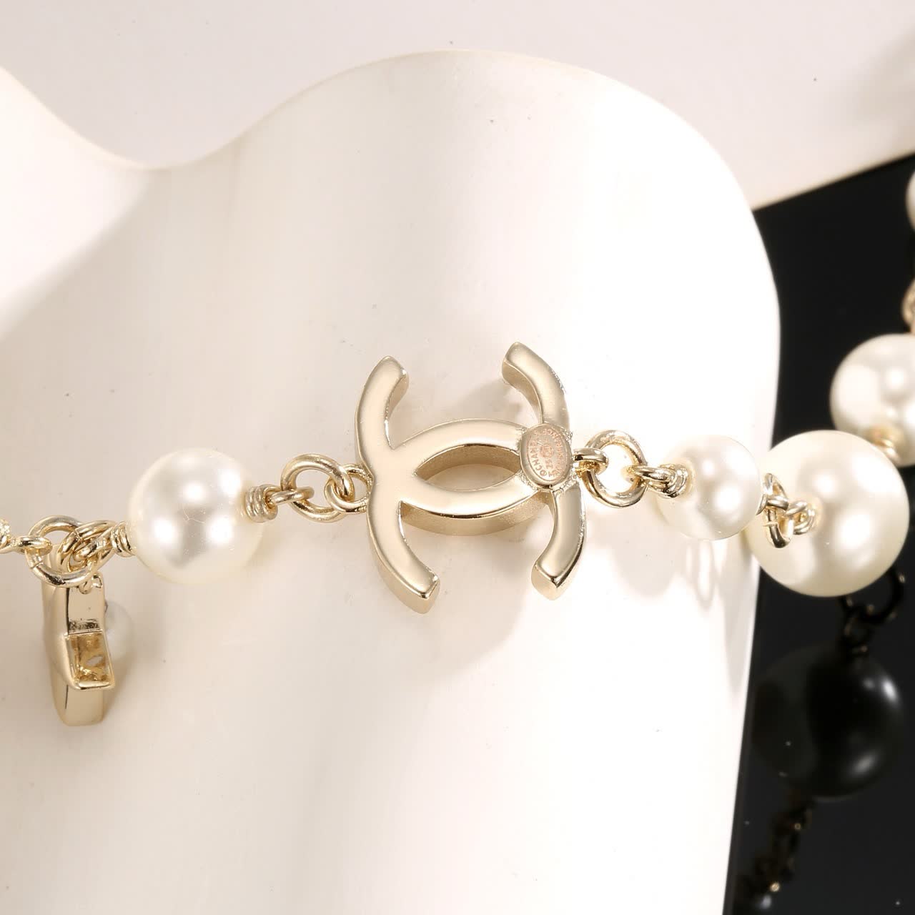 Chanel Pearl and Charm Necklace