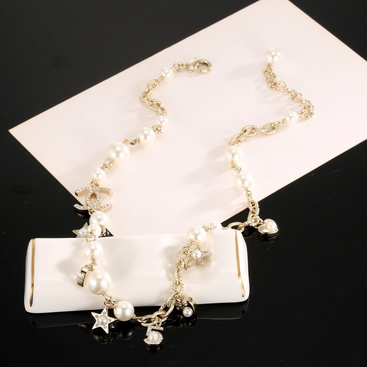 Chanel Pearl and Charm Necklace
