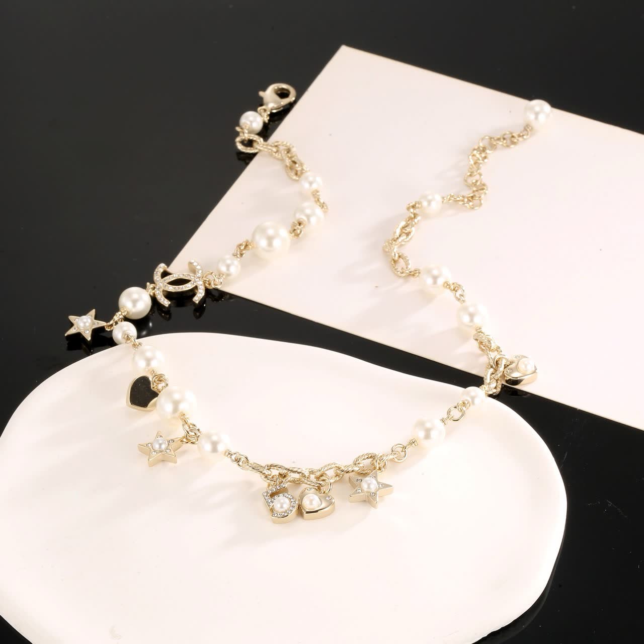 Chanel Pearl and Charm Necklace