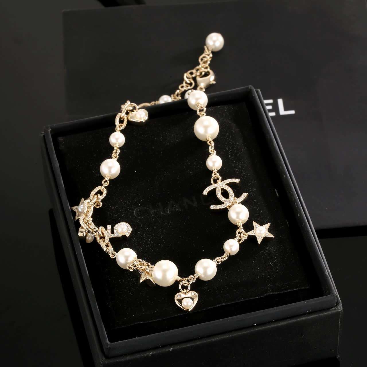 Chanel Pearl and Charm Necklace