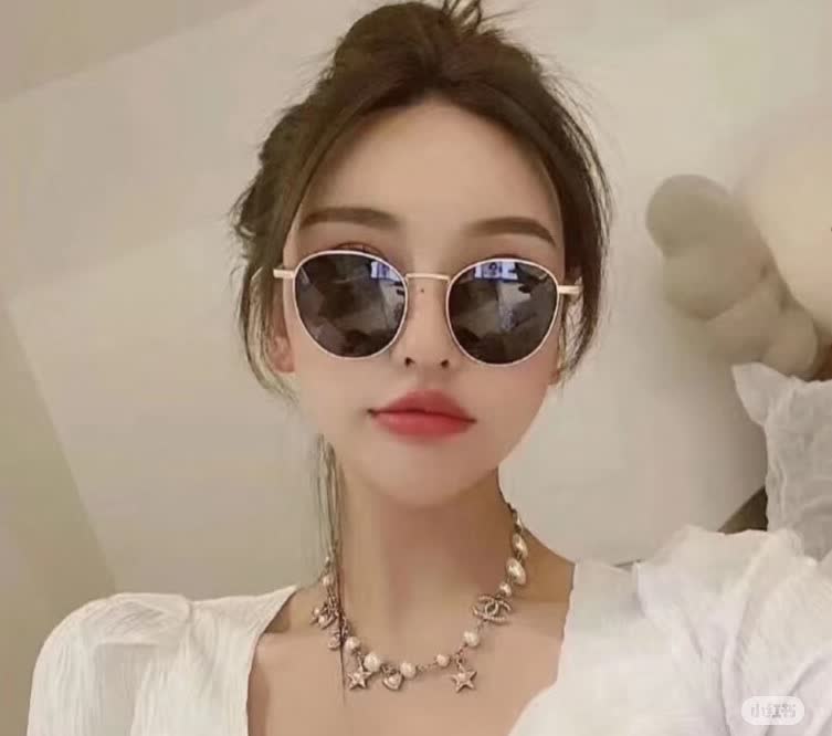 Chanel Pearl and Charm Necklace