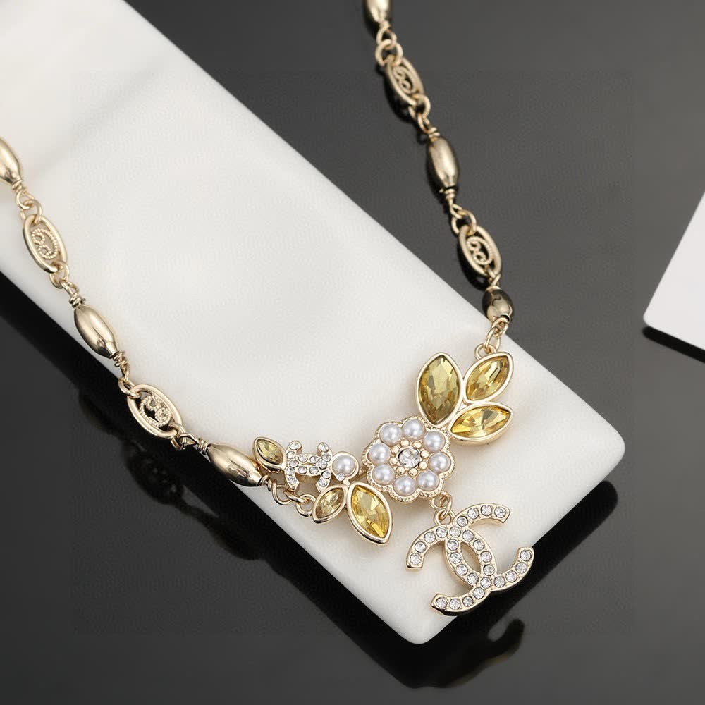 Chanel Gold Tone Chain Necklace with Crystal CC Logo and Gemstone Flower Design