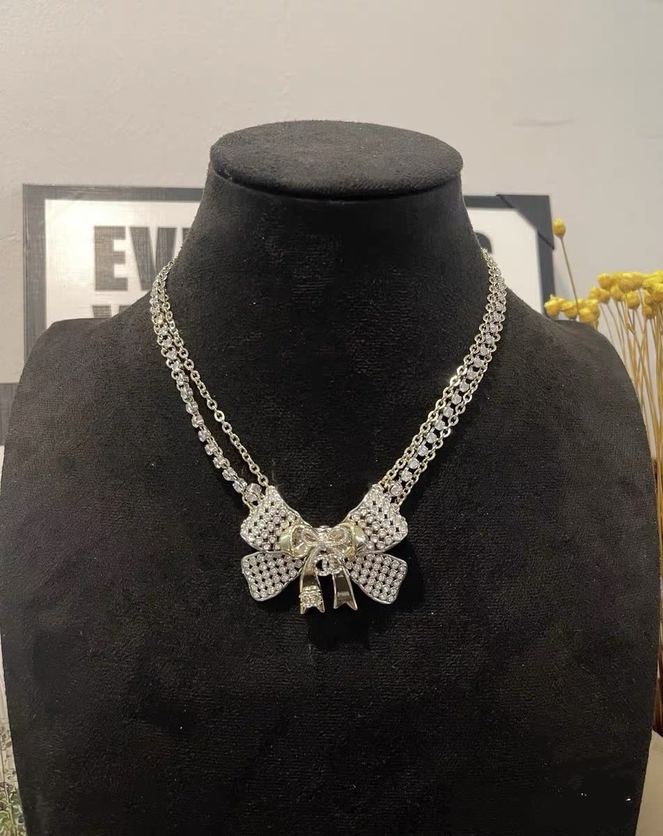 Chanel Silver Bow Statement Necklace