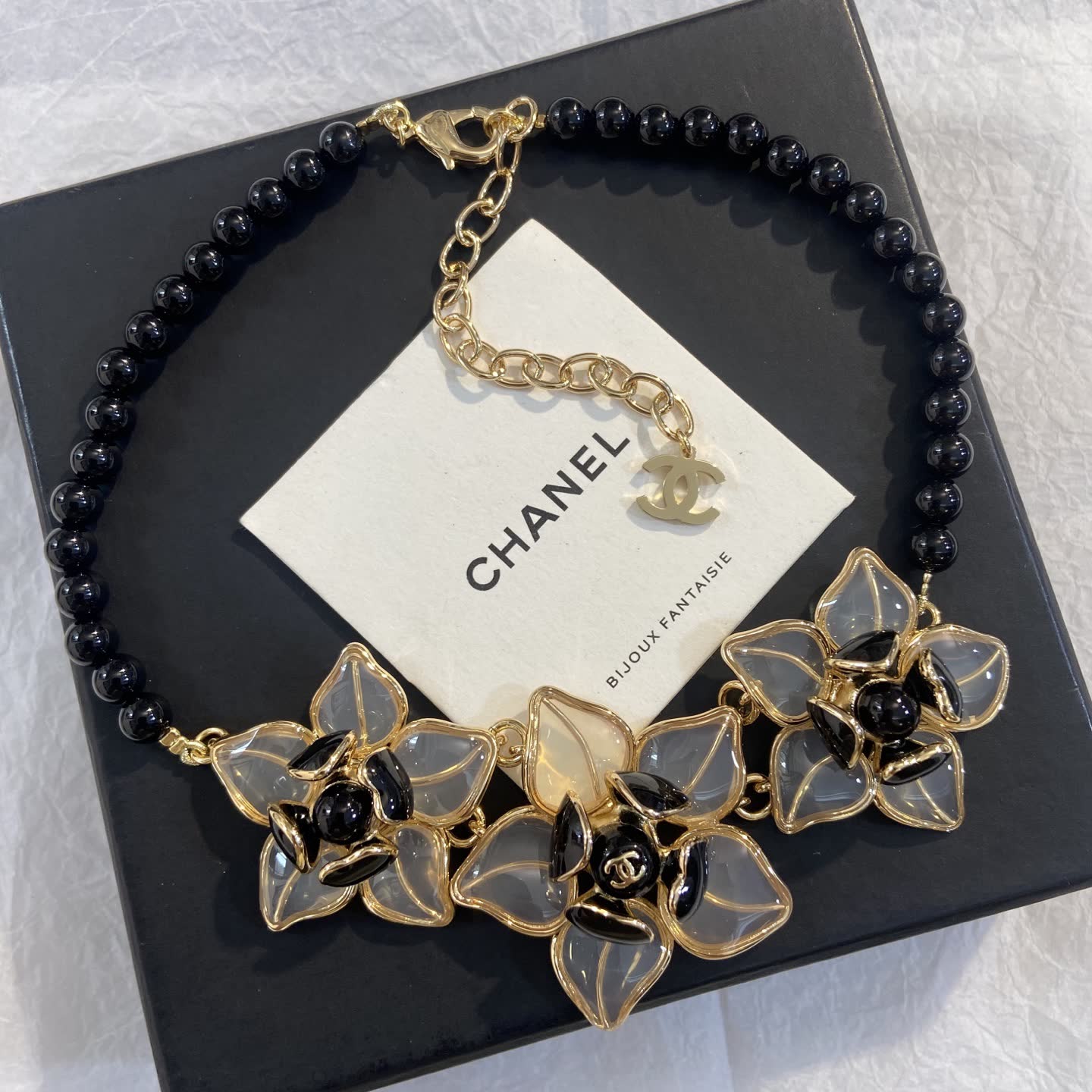 Chanel Beaded Necklace with Gold and Black Flowers Chanel Beaded Necklace with Gold and Black Flowers