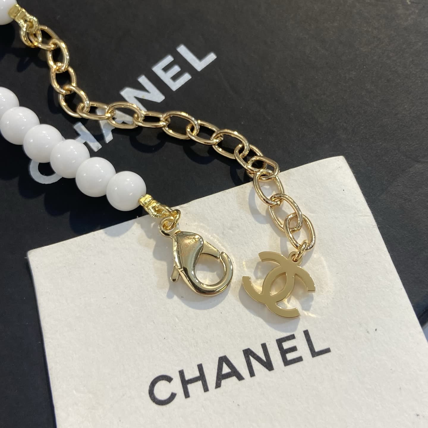 Chanel Beaded Necklace with Gold and Black Flowers