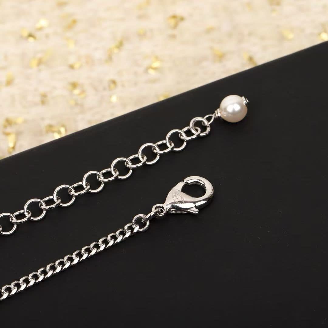 Chanel Pearl and Heart Charm Necklace