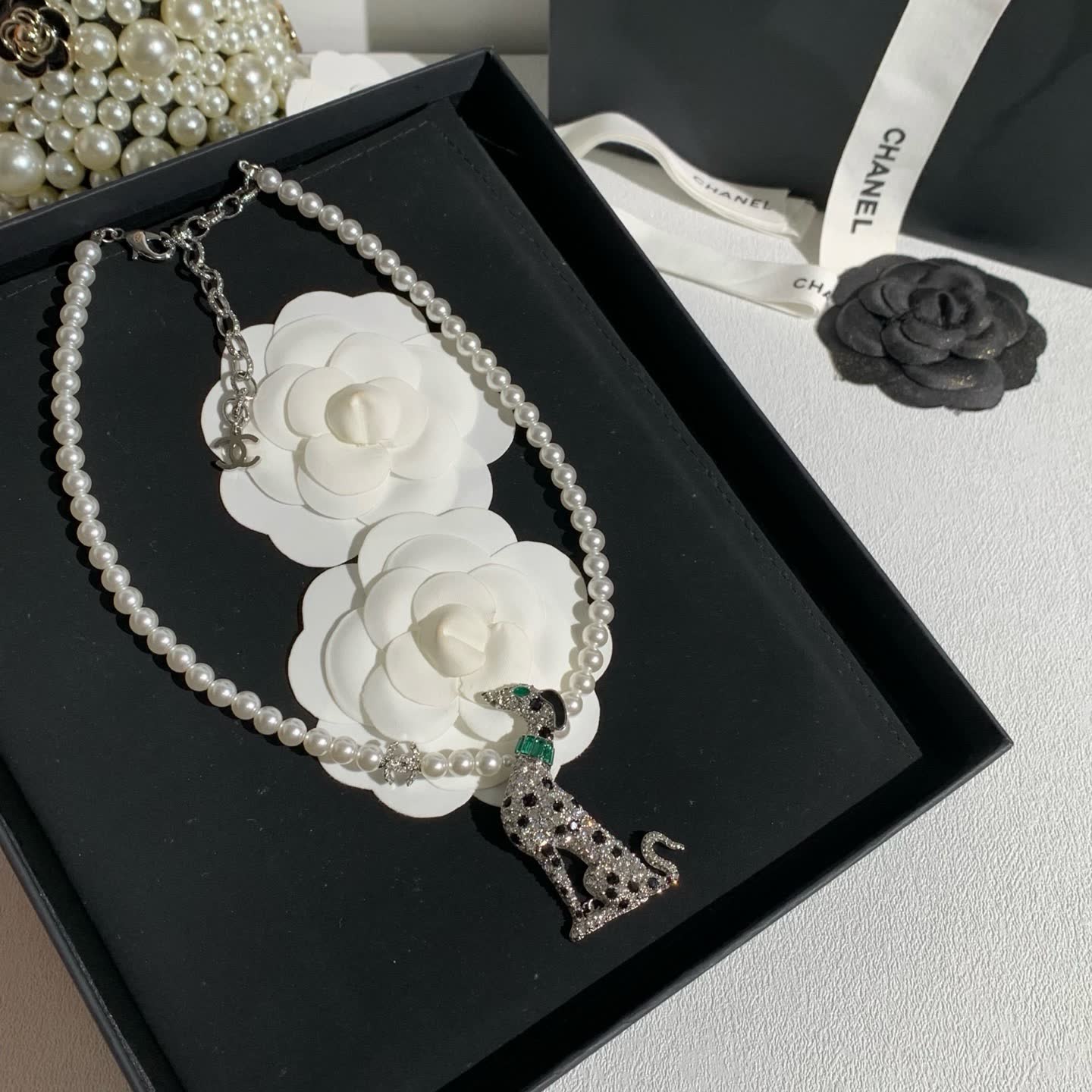 Chanel Elegant White Pearl and Diamond Dog Pendant Necklace