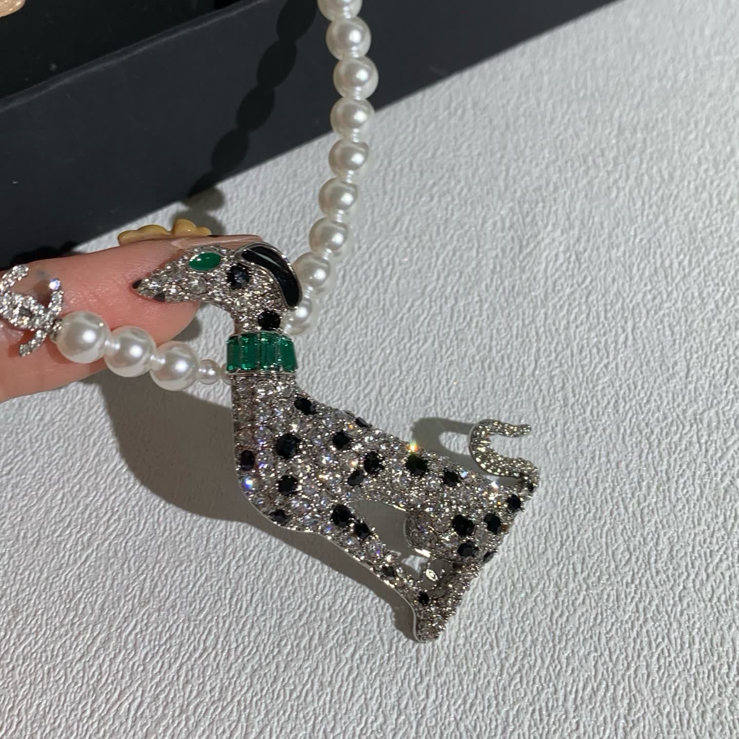 Chanel Elegant White Pearl and Diamond Dog Pendant Necklace