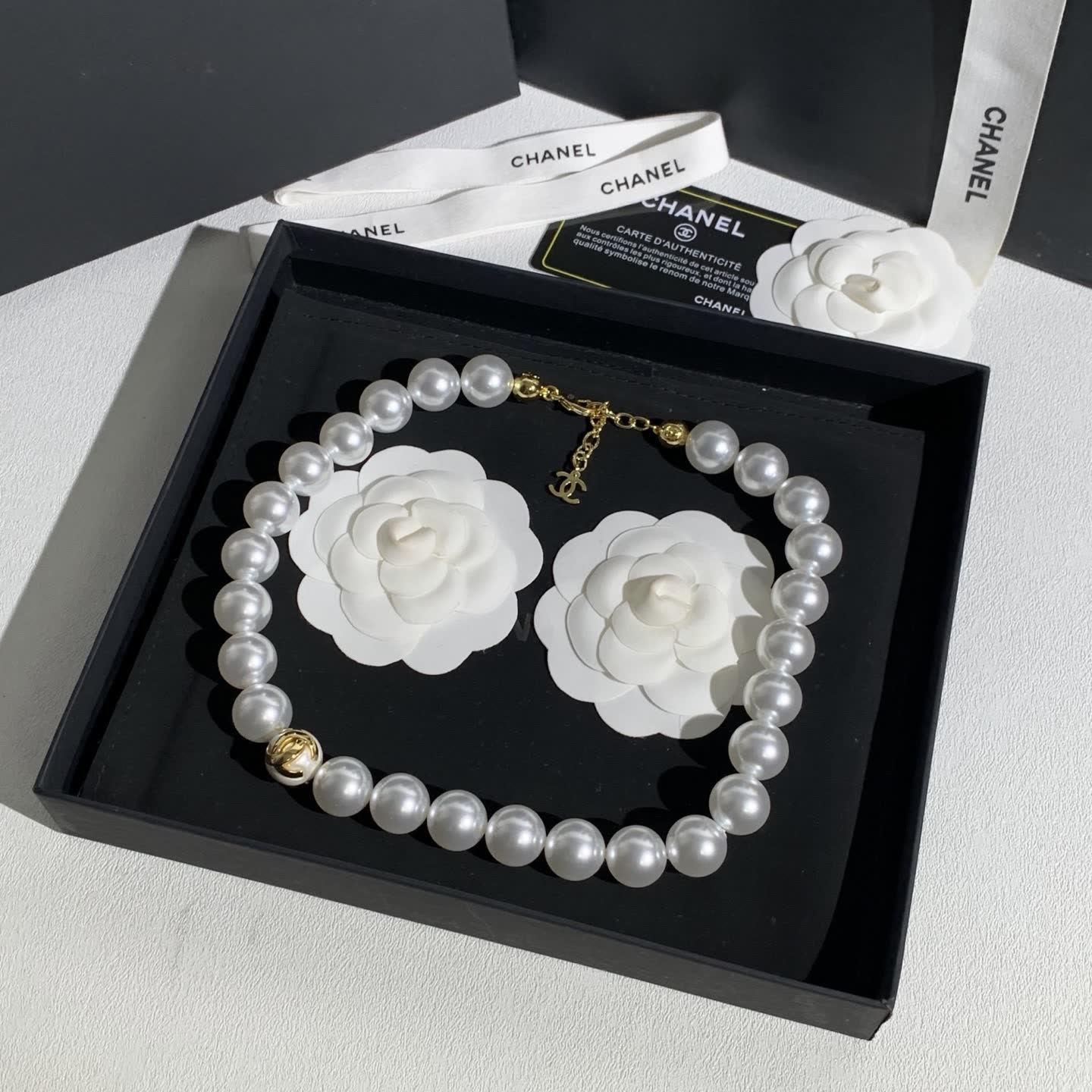 Chanel Elegant White Pearl Necklace with Gold Clasp
