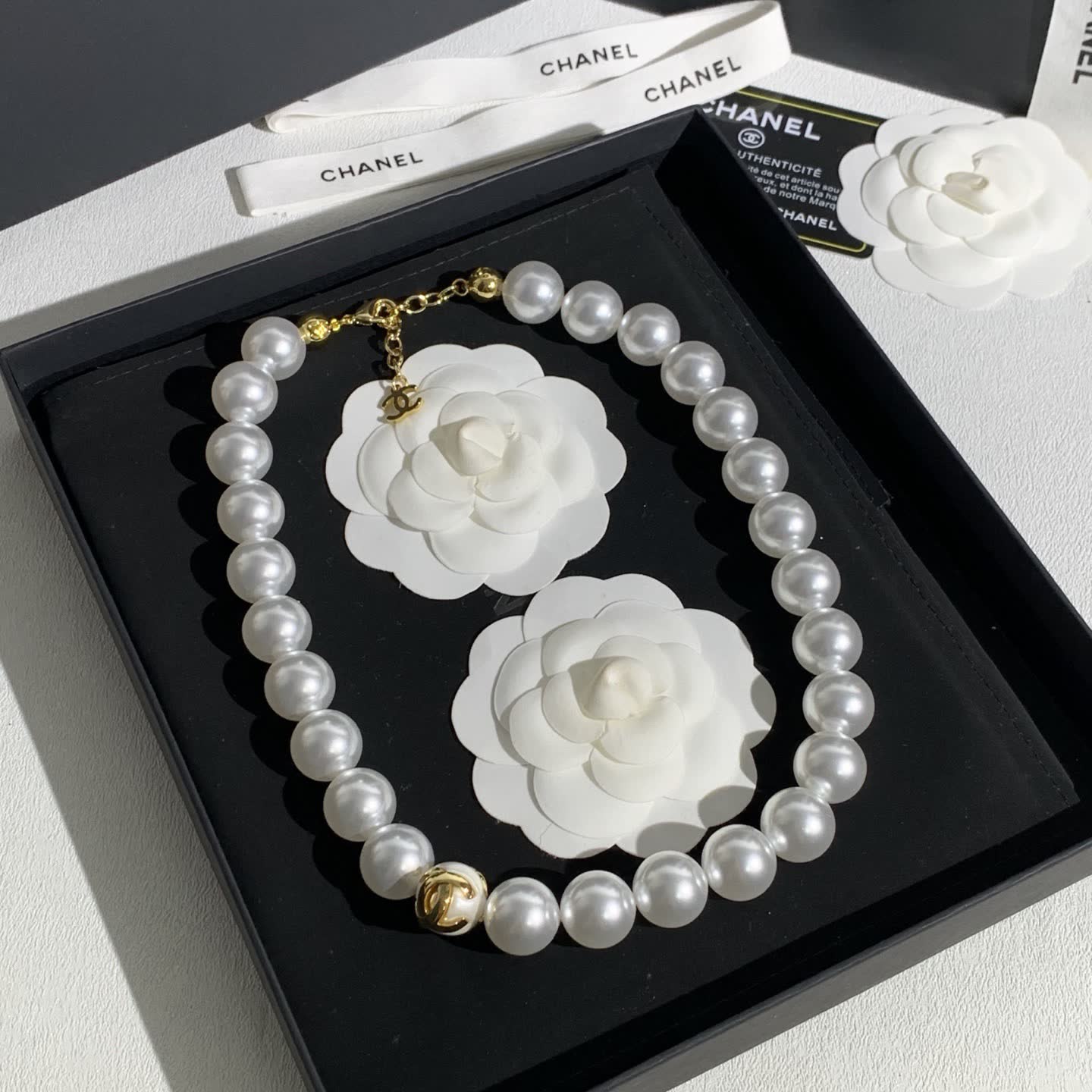 Chanel Elegant White Pearl Necklace with Gold Clasp