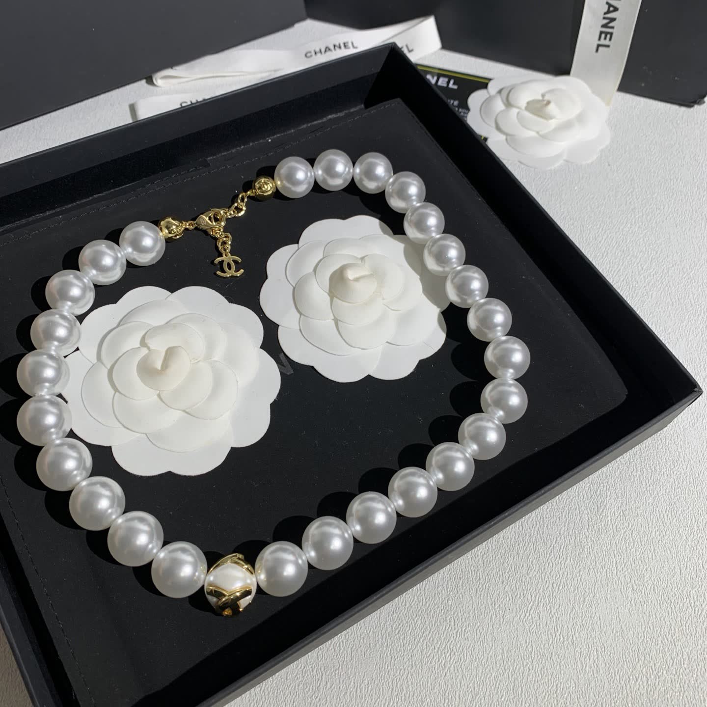 Chanel Elegant White Pearl Necklace with Gold Clasp