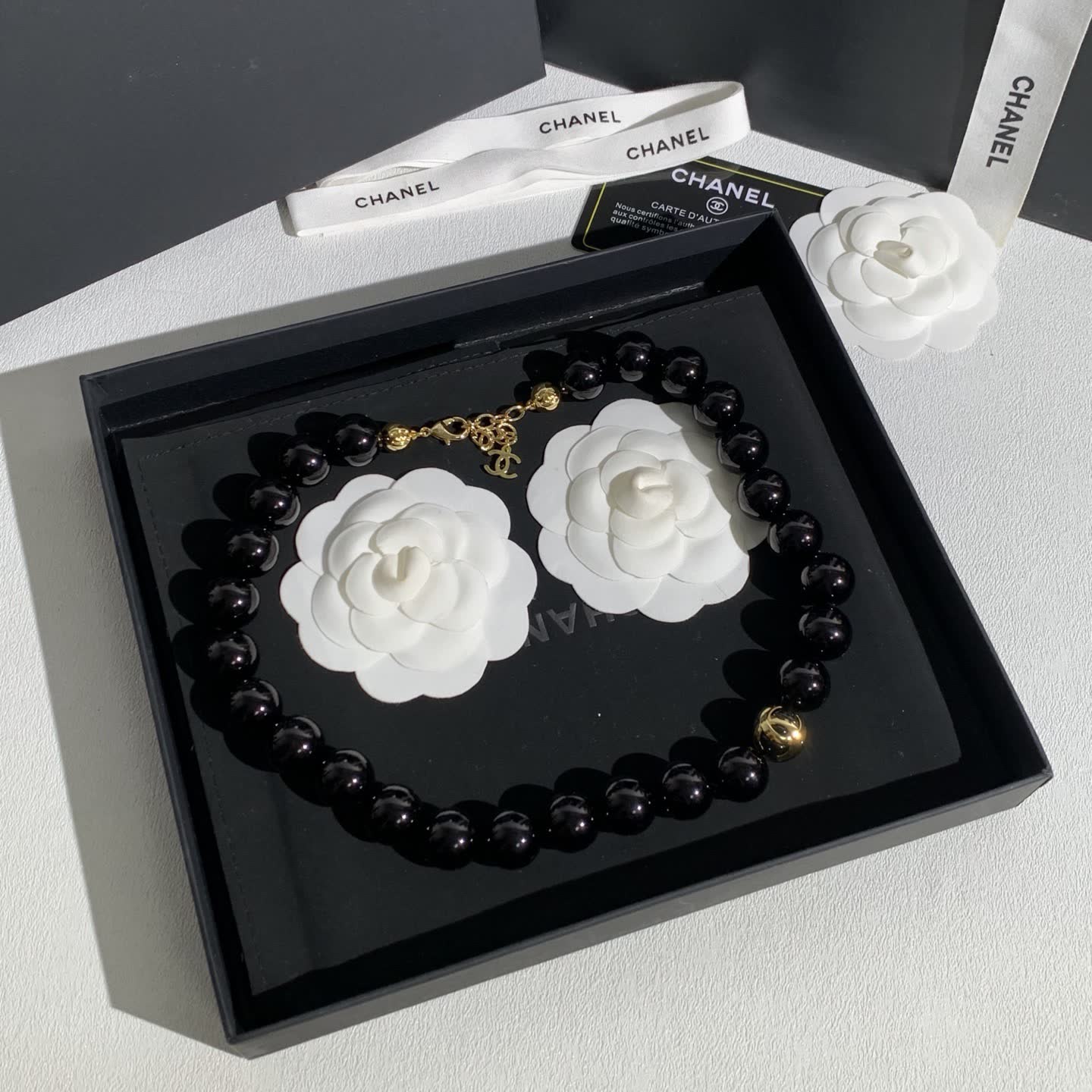 Chanel Black Bead Necklace with Gold Logo