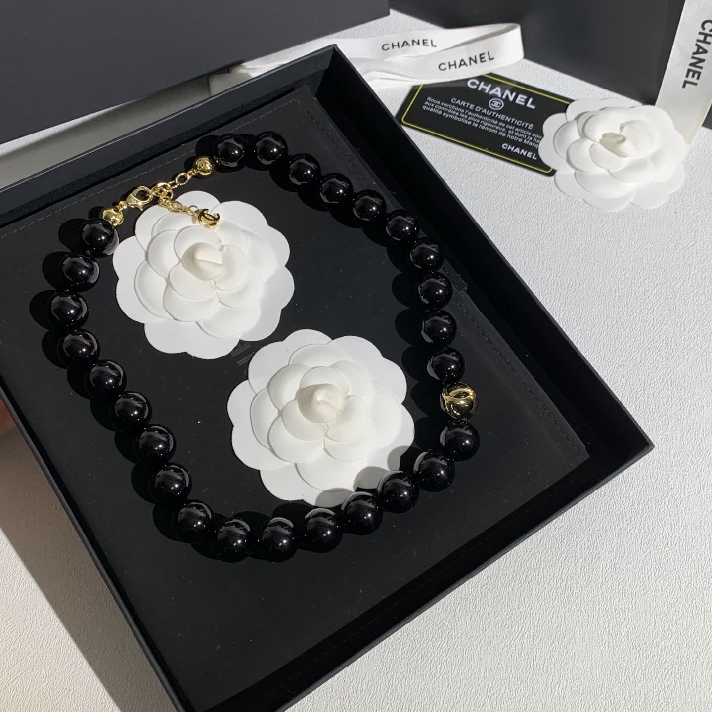 Chanel Black Bead Necklace with Gold Logo