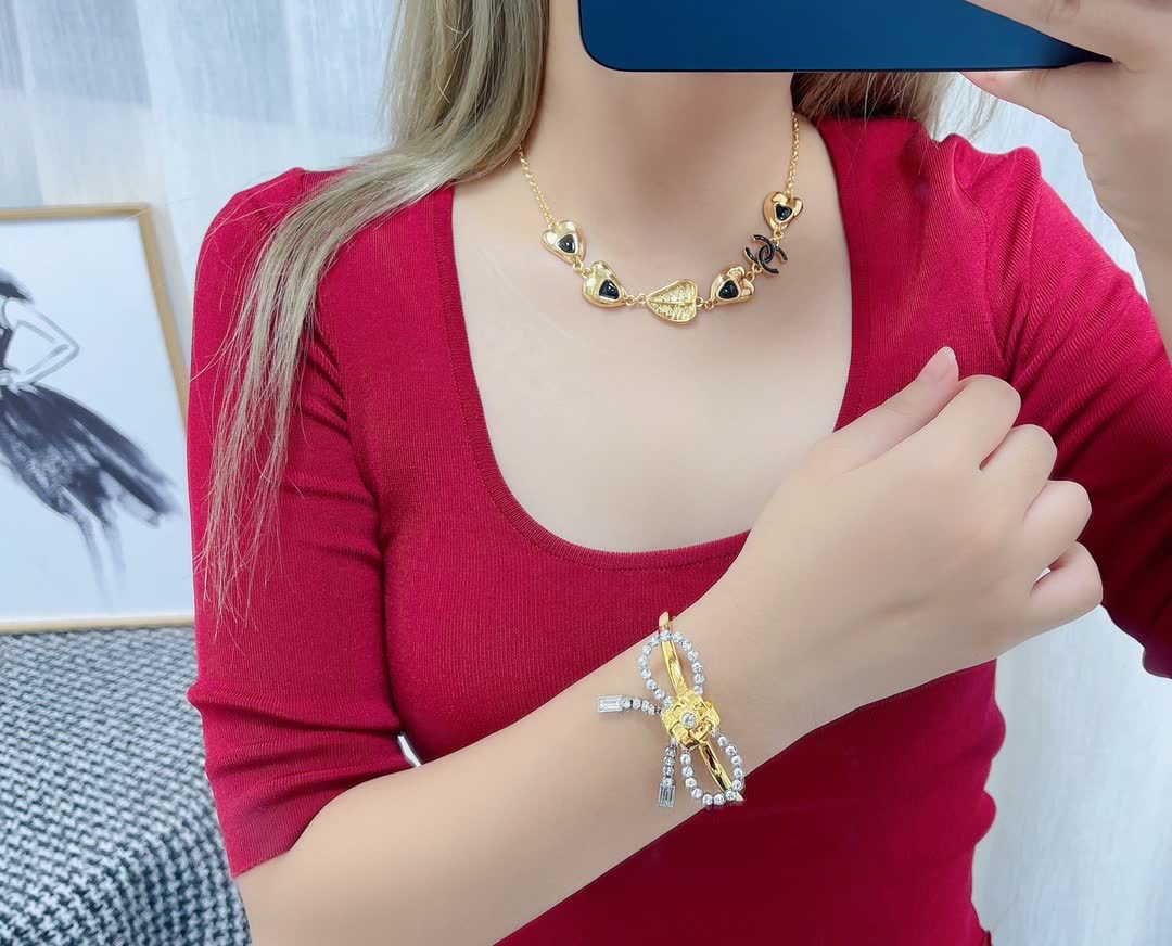 Chanel Gold Tone Heart and Leaf Necklace with Black Stones
