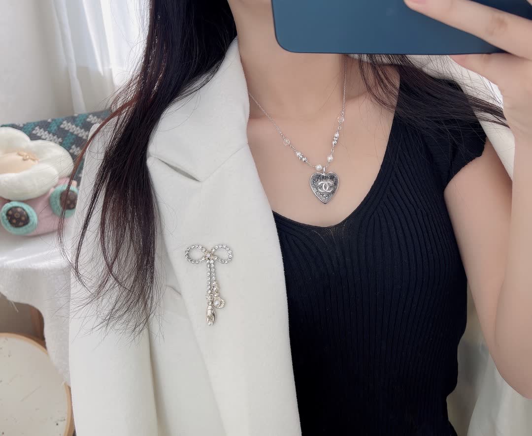 Chanel Black Beaded Necklace with Heart Charm