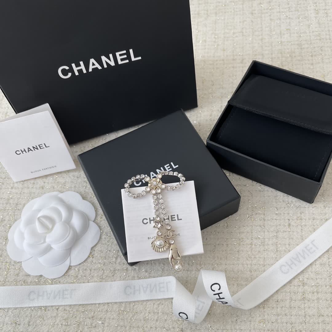 Chanel Black Beaded Necklace with Heart Charm
