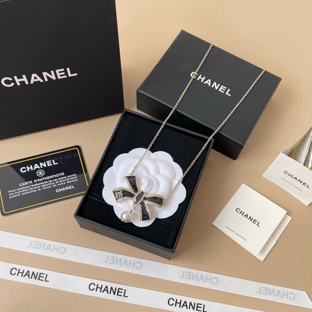 Chanel Black Diamond and Pearl Bow Pendant Necklace