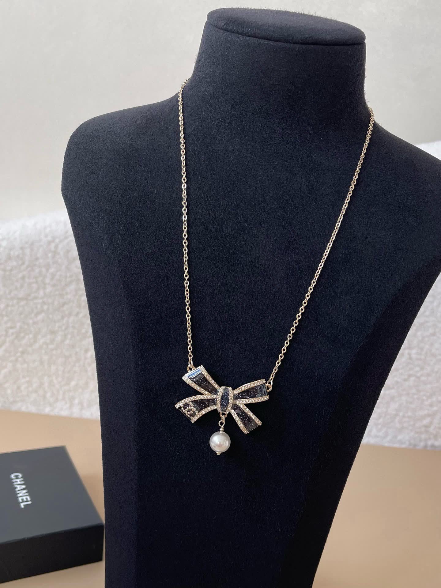 Chanel Black Diamond and Pearl Bow Pendant Necklace