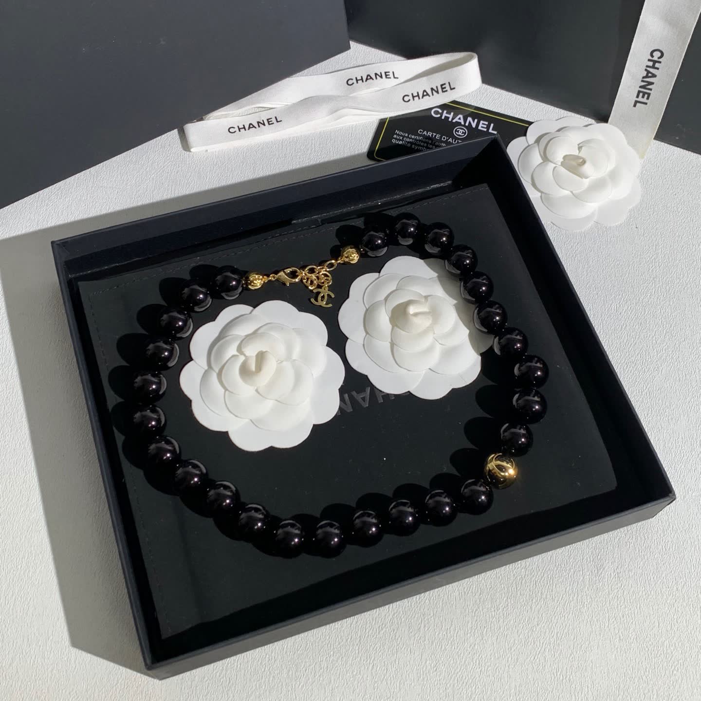 Chanel Black Bead Necklace with Gold Logo