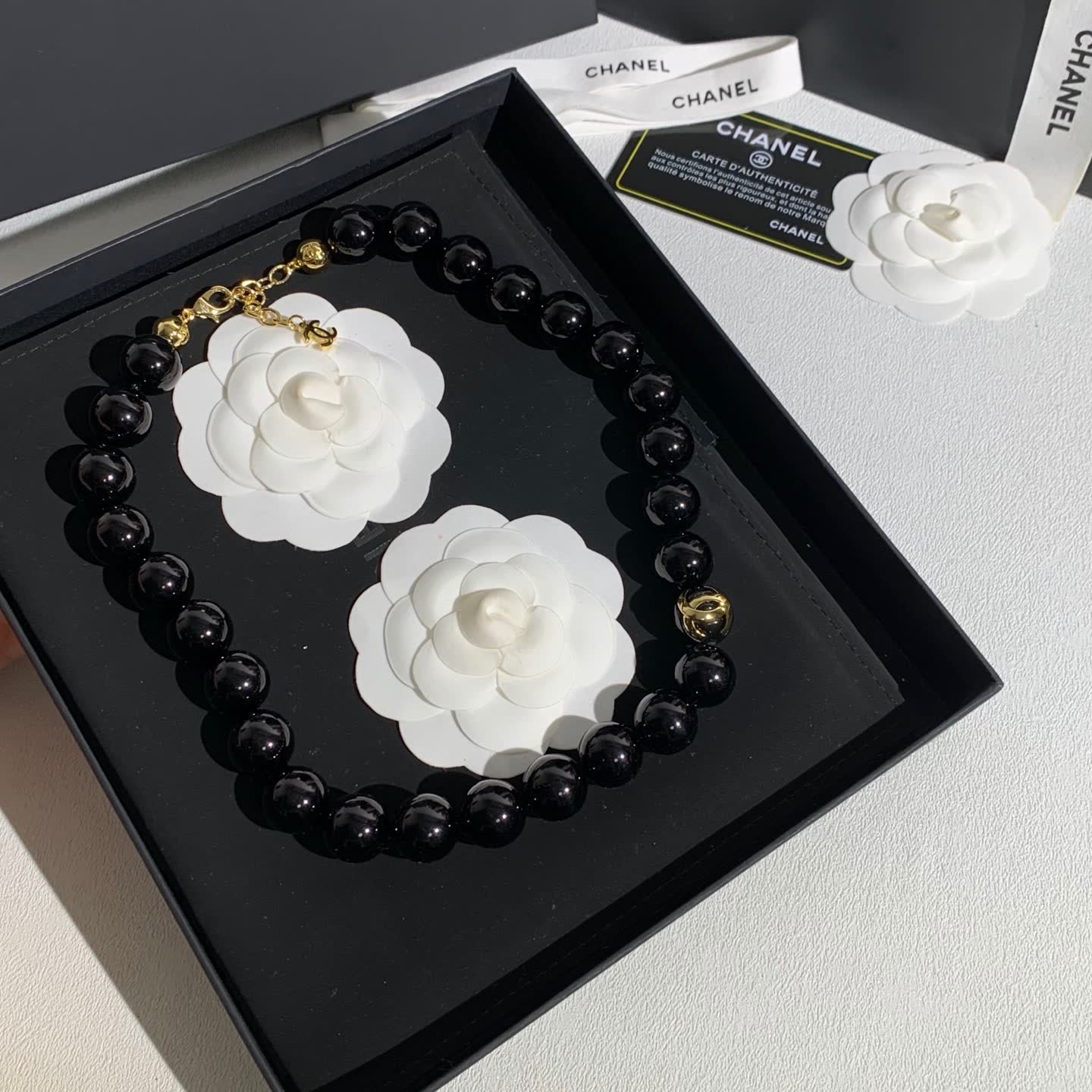 Chanel Black Bead Necklace with Gold Logo