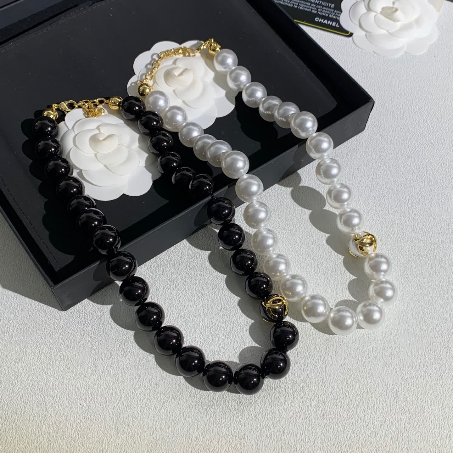 Chanel Black Bead Necklace with Gold Logo