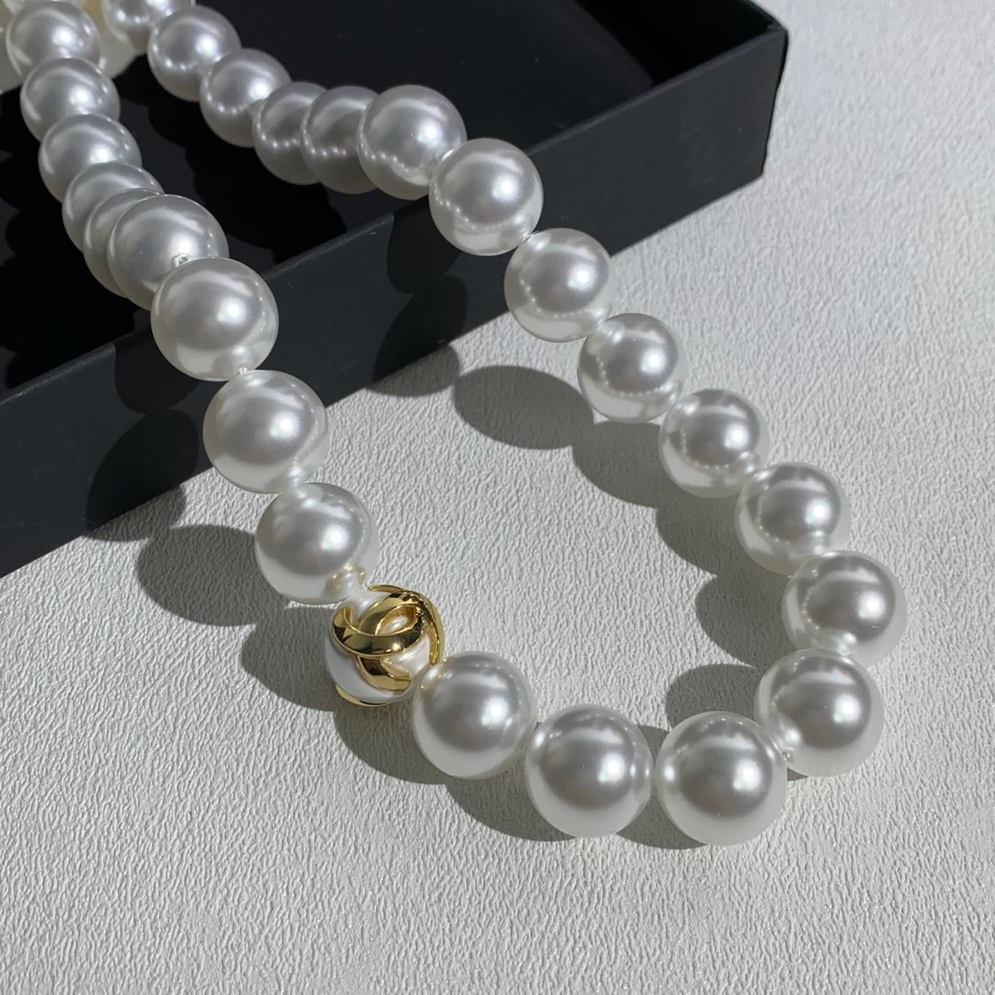 Chanel Elegant White Pearl Necklace with Gold Clasp