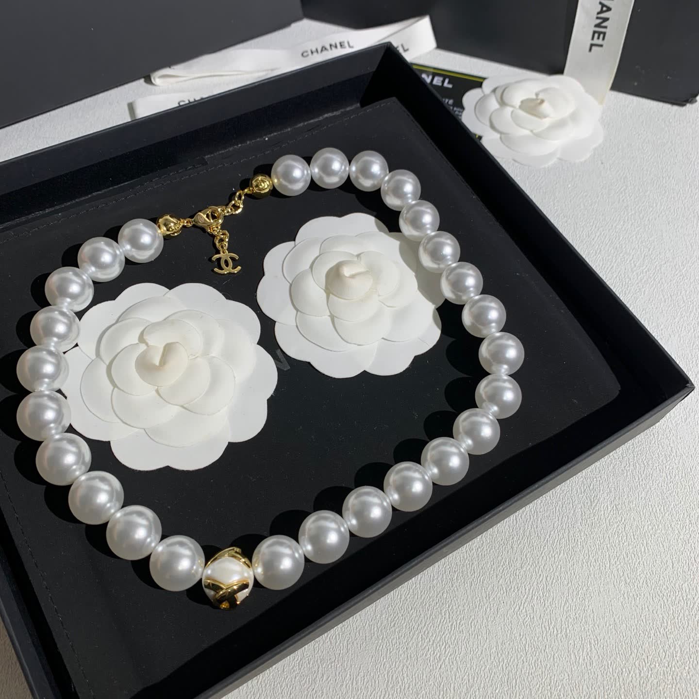 Chanel Elegant White Pearl Necklace with Gold Clasp