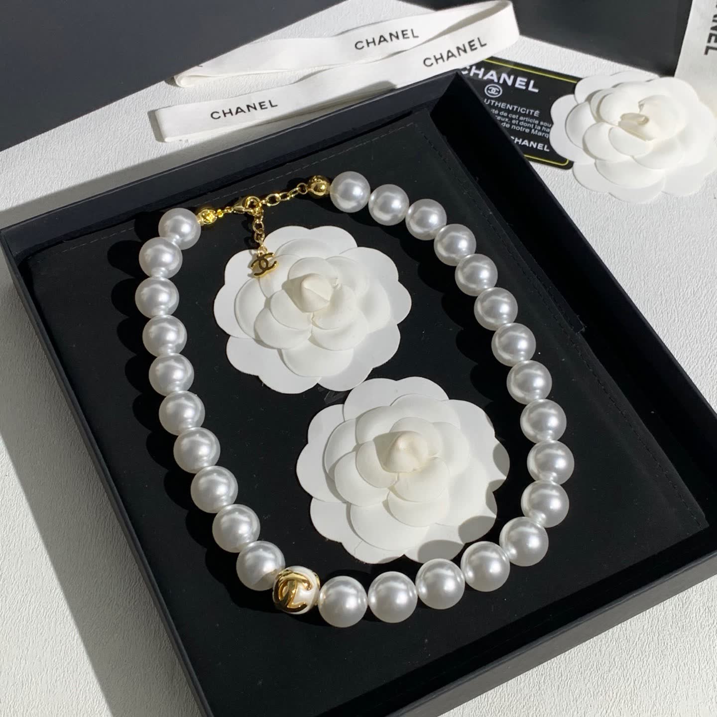 Chanel Elegant White Pearl Necklace with Gold Clasp