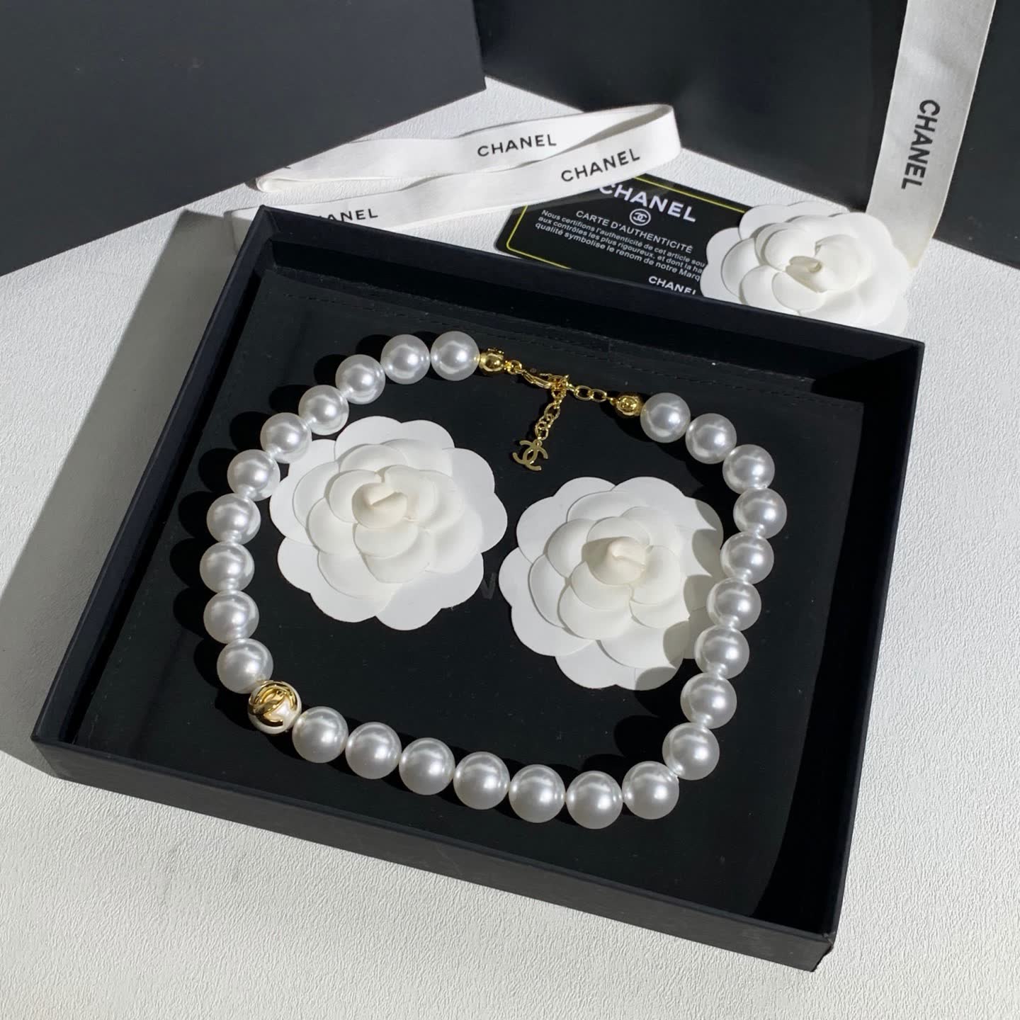 Chanel Elegant White Pearl Necklace with Gold Clasp