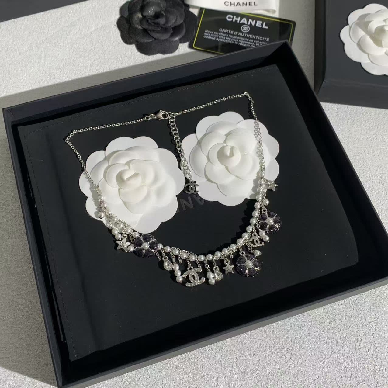 Chanel Silver Charm Necklace