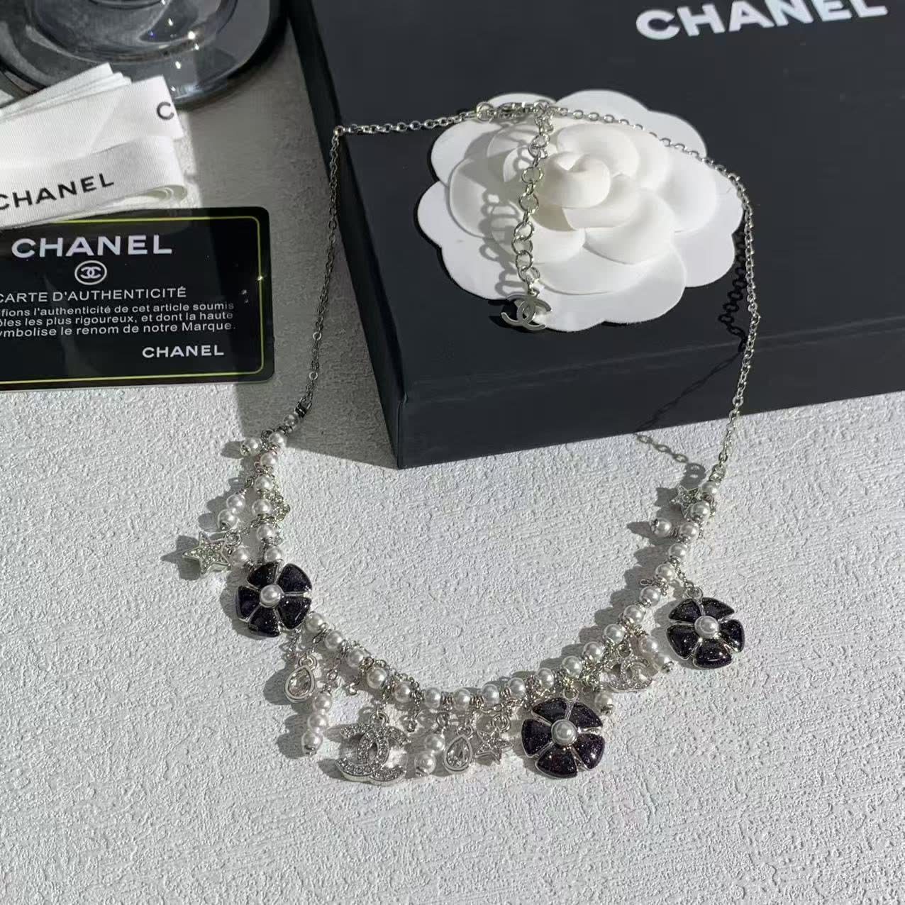 Chanel Silver Charm Necklace
